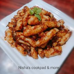 A picture of Korean chewy garlic Potato in Red sauce.