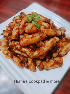 A picture of Korean chewy garlic Potato in Red sauce.