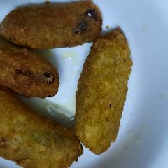 Green chicken chillos fritters A picture of Green chicken chillos fritters.