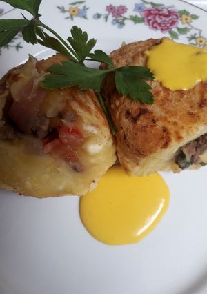 Una foto de Yuquitas rellenas con Lomo Saltado🇵🇪
