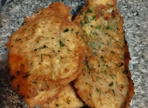Una foto de Milanesas de pollo con rebozado saborizada (de la serie Nada)