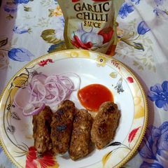 A picture of Beef seekh kabab in pan.