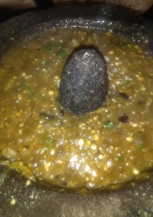 A picture of Charred Green Salsa Molcajeteada.