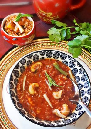 A picture of Quinoa porridge In Red Thai Gravy.