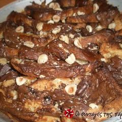 A picture of Tsoureki bread pudding with hazelnuts and chocolate.