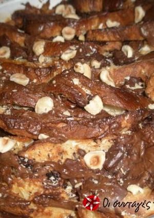 A picture of Tsoureki bread pudding with hazelnuts and chocolate.