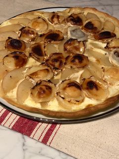 Une photo de Pizza chèvre poires et miel