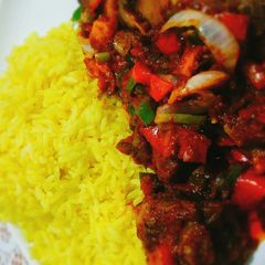 Tumeric rice n gizzard vegetables A picture of Tumeric rice n gizzard vegetables.