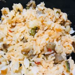 A picture of Omrice or fried rice.