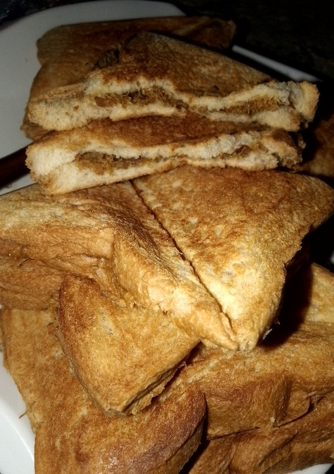 A picture of Toast with meat.