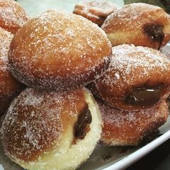 A picture of Donuts fillled with Nutella (aka Bomboloni).