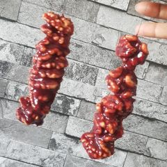 A picture of Georgian walnut churchkhela or walnut candy.