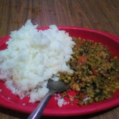 A picture of Rice and ndegu.