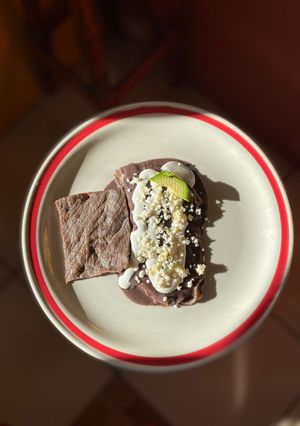 Una foto de Enfrijoladas