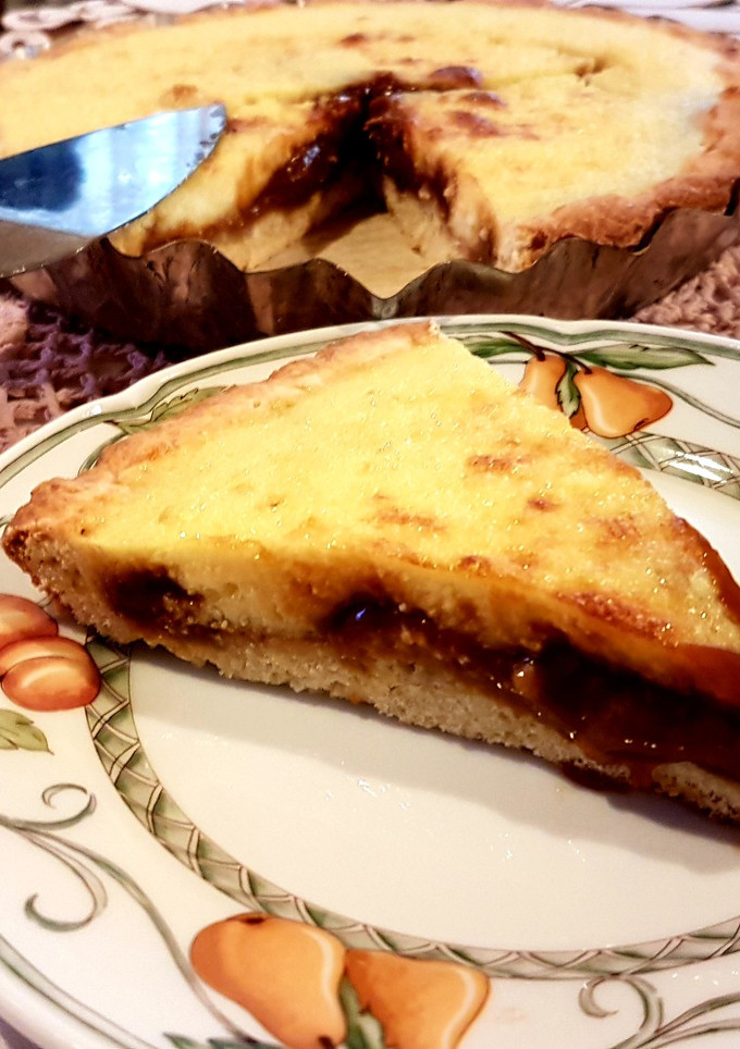 Una foto de Tarta de ricota y dulce de leche