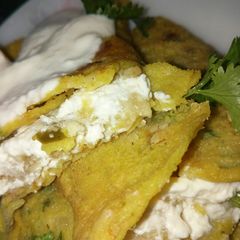 A picture of Mung Dal Cheela with stuffed Paneer.