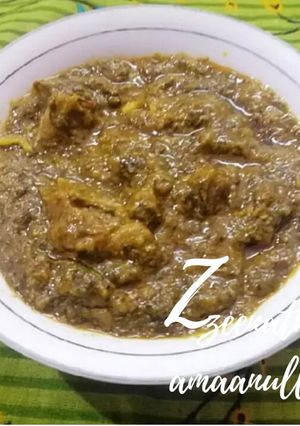 A picture of Green Mutton Gravy or Ambada and Chukka Gosht.