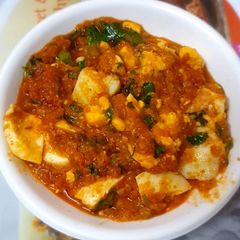 A picture of Tomato masala egg.