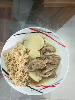 Una foto de Bisteces de puerco con papas estilo Yucateco