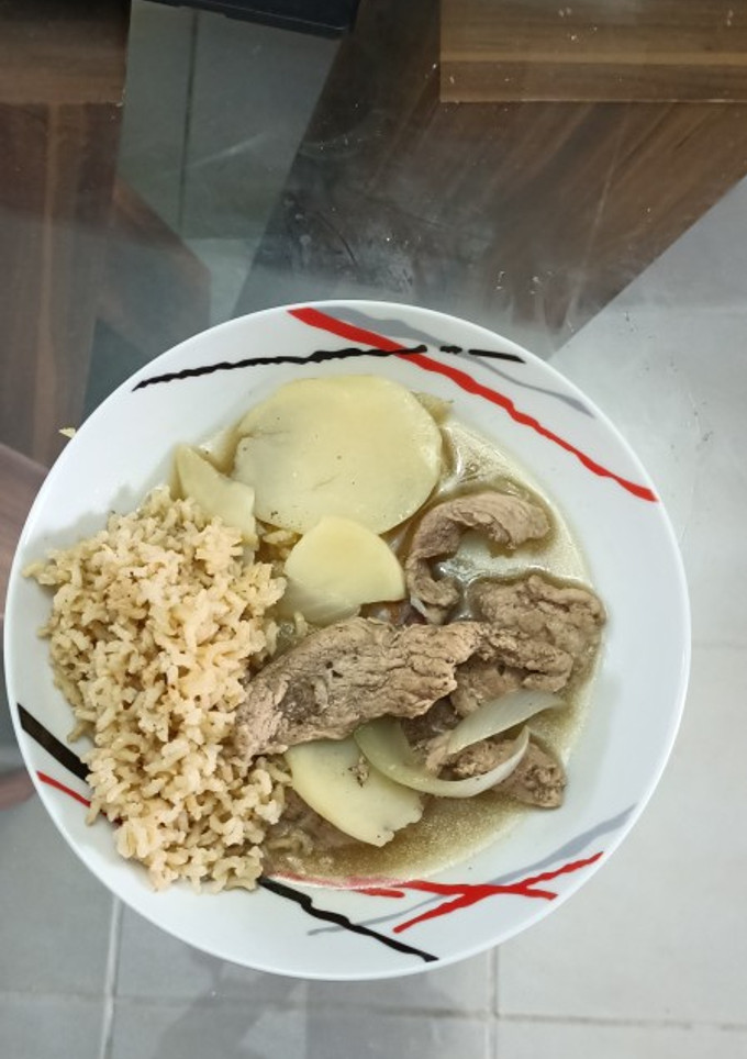 Una foto de Bisteces de puerco con papas estilo Yucateco