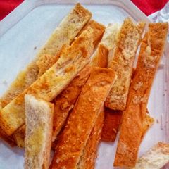A picture of Cheesy Savoury Crisp from Leftover Sandwich Crusts.