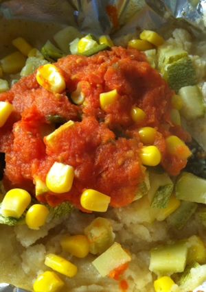 Una foto de Pescado empapelado con calabacitas 2
