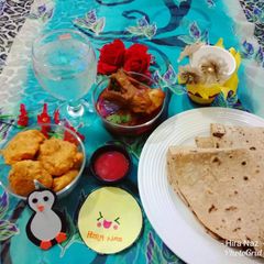 A picture of Aloo Chap and Chicken Ka Salan With Roti.
