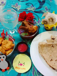A picture of Aloo Chap and Chicken Ka Salan With Roti.