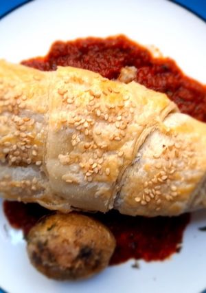 Una foto de Rollo de chile poblano hojaldrado