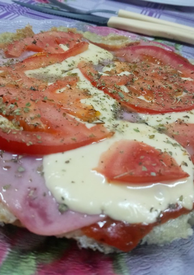 Una foto de Pizza con base de papa rallada