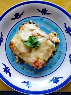 Una foto de Pizza de Zapallito Italiano relleno de Camarones y Pulpo