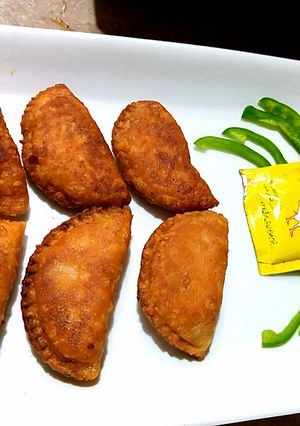 A picture of Chicken cheese D samosa 🍣🍣🍣🍣❤❤❤.