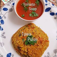 Tawa Pulav With Tomato Soup A picture of Tawa Pulav With Tomato Soup.