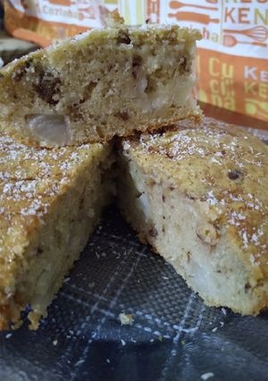Una foto de 🥥Budín de pera, nueces y coco🍐