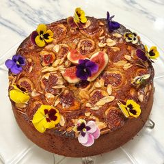 A picture of Fig, honey and almond cake.