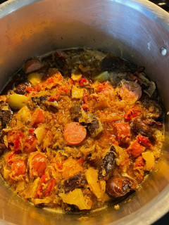 A picture of Kielbasa with Sauerkraut.