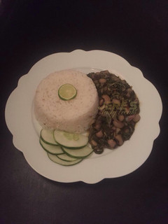 A picture of Local rice with vegetable soup.