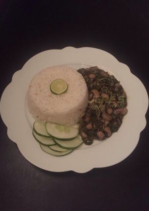 A picture of Local rice with vegetable soup.