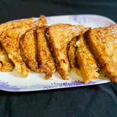 A picture of French Toast/kids breakfast.