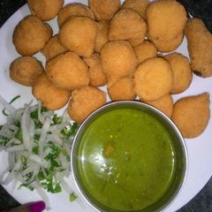 A picture of RAM LADDOO ( Yellow Lentil Balls).