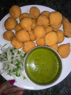 A picture of RAM LADDOO ( Yellow Lentil Balls).