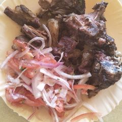 A picture of Kachumbari with fried beef.