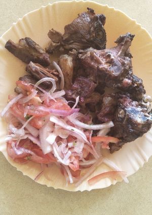 A picture of Kachumbari with fried beef.