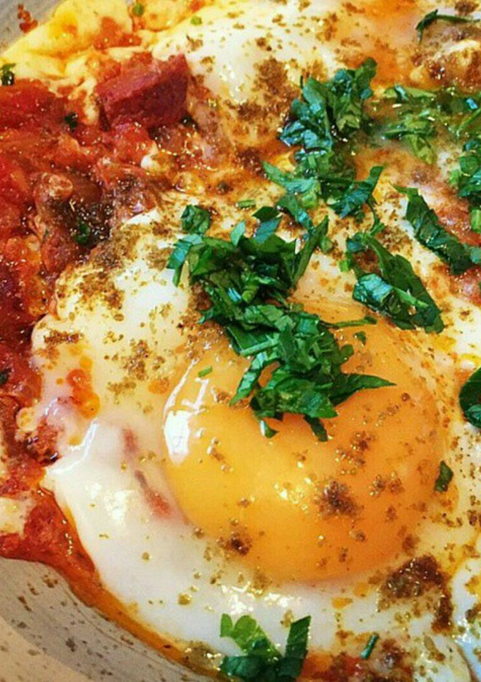 Una foto de Chakchouka (Huevos con tomate, cebolla y pimiento)