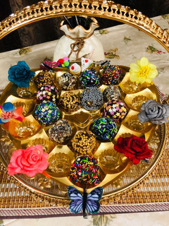 A picture of Rainbow 🌈 date balls.