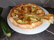 Una foto di torta salata stracchino