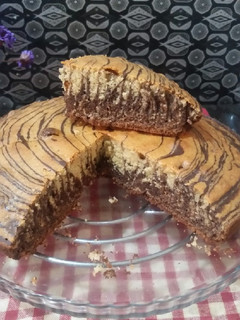 A picture of Zebra print chocolate cake.
