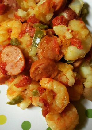 A picture of Shrimp and sausage smash potatoes.