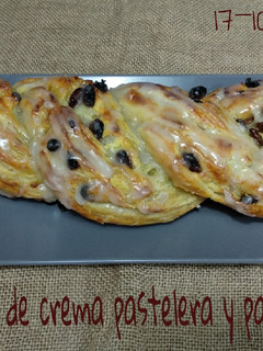 Una foto de Trenza de hojaldre, crema pastelera y pasas