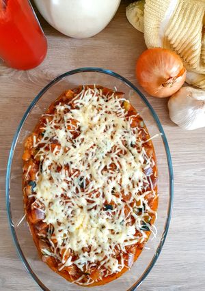 Une photo de Gratin fondant aubergines graffitis courgettes